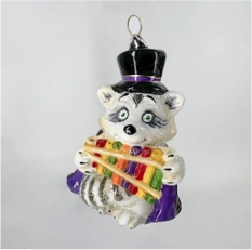 Handmade glass Christmas tree toy "Raccoon with xelophone"
