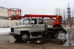 Self-propelled boom lift with working platform PSS-131.18E with all-metal box section boom on chassis base