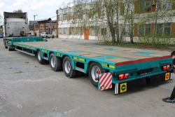 Semitrailer 9854 in modification 9854-0000060-07 variant with metal platform with mechanical ladders, with cones, with pneumatic