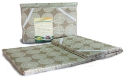 Bedding articles for adults with the trade mark "Belio": quilted mattress covers filled with polyurethane type H-PU.
