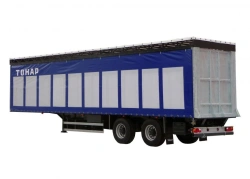 Semi-trailer of cargo model Tonar 974617 with axles manufactured by TONAR of models: 90422, 90424, 90431