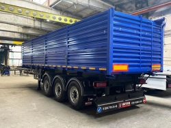 Tipper semitrailer with rear dump body type 85333, modification 853332. Metal tipper body of square cross-section with tilting b