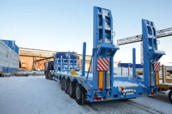 Semitrailer Politrans 94165-040. Wheel axle "Plant" 1201-2410002. Tyre 385/65R22,5. In version: platform with straight load p