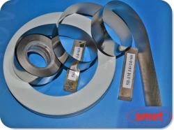 Magnetically soft amorphous alloys and magnetically soft composite material (nanocrystalline alloy) ribbon magnetoconductors
