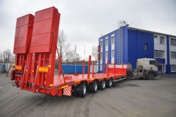 Semitrailer Politrans 94184-063. In the version: metal sliding platform with straight load platform, with flatbed