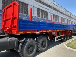 Semitrailer Politrans 94171-0000011. In version: metal platform with decking, with boards, with racks (cones), with modular, axl