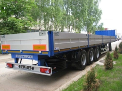 Three-axle flatbed semitrailer model RV-24 of modification RV-24A with axle unit BPW HSFALM 9010-15 V36 61.68.361.147QS, with ty