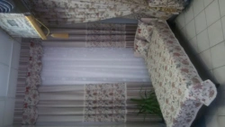 Curtains (including drapes) and inner curtains; lambrequins and bedspreads of cotton yarn.