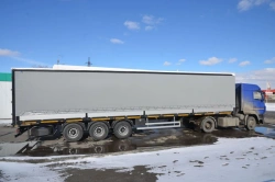 Semitrailer Politrans 94171-0000021. In design: metal platform with decking, with sides, with posts (cones), with storne