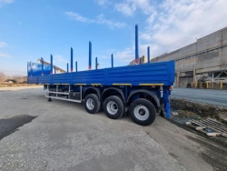 Semitrailer Politrans 94171-031. In the version: metal platform with decking, with pneumatic suspension.