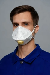 Disposable filtering half-mask for protection against aerosols "Respirator "SPIRO-111" ?.2 FFP1 NR D".