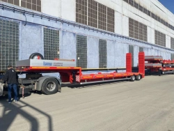 Semitrailer-heavy hauler Politrans 94182-010. In version: metal platform with straight load platform, with flatbed platform