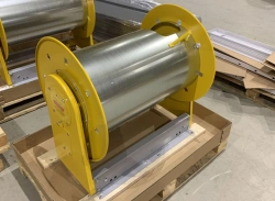 Exhaust extraction coil with spring drive for exhaust gas removal
