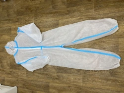 Set No. 4 consisting of: Overalls, Shoe covers, Instructions for use