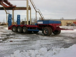 Polytrans trailer 84289-0000070. In version: platform with decking, with straight load platform, with pneumatic suspension. Axle
