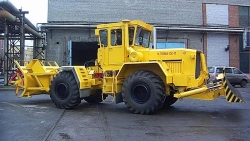 Wheeled snowplough on the basis of universal tractor module "Kirovets" K-703MA-OS (Universal Tractor Module with a canopy) 169:W