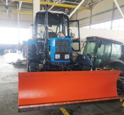 Machinery for road and municipal services UDKM-6 on the basis of Belarus 82.1 wheeled tractor, with attachment: mouldboard y