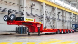 Specialised semi-trailer 98525 in modifications 985251, 985252, 985253, 985254 version with metal platform with sides