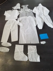 Disposable non-sterile medical clothing set (coveralls, helmet cap)