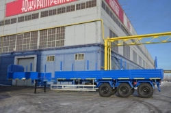 Semitrailer Politrans 94171-060. In design: metal sliding platform with decking, with sides, with posts(cones), with a