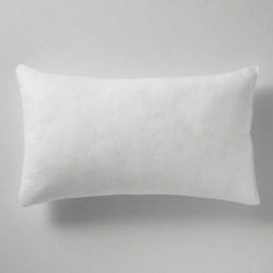 Pillow with synthetic fibre filling