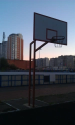 Basketball rack stationary outdoor with ring and vandal resistant net