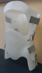 Rigid fixation corset