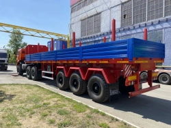Semitrailer Politrans 94171-0000010. In version: metal platform with decking on spring suspension.