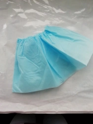 Low shoe covers included in the Set of surgical clothing and linen, disposable, sterile and non-sterile KH "GEKSA".