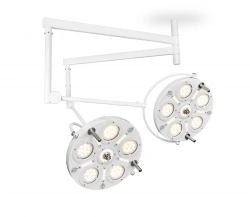 Medical LED surgical luminaire with ceiling mount (ceiling-mounted double-dome with two 6-module luminaires)