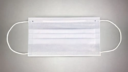 Medical disposable masks of nonwoven materials (??20/???25/??20) non-sterile three-layer, density 65g/m2, white