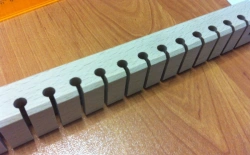 Wooden strip for storing 30 counting beads