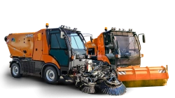 Communal machine KM-2000 with hopper and attachments manufactured by "TC PM" Ltd. and hydrostatic transmission manufactured by "