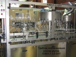 Automatic line with capacity up to 2500 bottles/hour for PET and glassware, capacity up to 2 litres as follows: YUVEST-2,5 BNT;Y