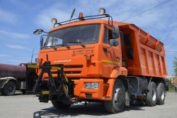 Combined KMD-65115S-E5 harvesting machine with all-metal hopper and all-metal tank on the basis of dump truck