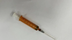 Single-use sterile three-detail "Luer" light-shielded sterile injecting syringe with nominal capacity of 5ml with needle