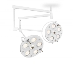 Medical LED surgical luminaire with ceiling mount (ceiling mounted double-dome, two 6-module luminaires, two 6-module luminaires