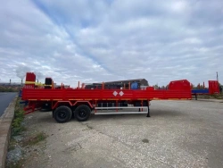 Semitrailer Politrans 9417-015. Wheel axle "Plant", 1201-2410002. Tyre 385/65R22.5,14.00R20. In version: metal platform