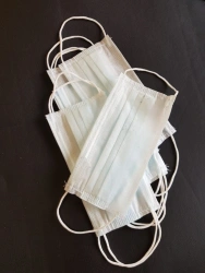 Disposable three-layer medical mask with ear fastening