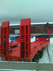 Semitrailer-heavy hauler Politrans 94161-010. In the version: metal platform with a straight load platform, with ladders, with s