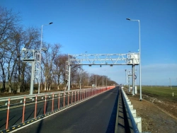 Automatic point of weight and dimensional control of vehicles in motion (APVGK ITS-Siberia)