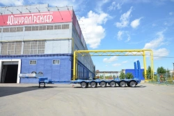 Semitrailer Politrans 94186-062; In the version of metal sliding platform with load platform with ramps with flatbed
