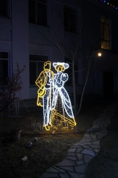 Illumination frame "Lady and Gentleman" - decorative street lamp, installed as an independent stationary fixture