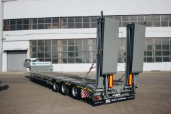 Semi-trailer Tverstroimash 993931 modification 0022 with spring-balanced suspension and hydraulic ramps