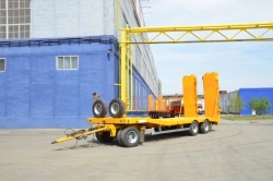 Heavy haulage trailer Politrans 84286-010. In design: metal platform with straight load platform, with flatbed in the