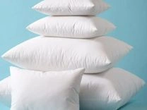 Pillows for adults made of cotton, blended fabrics with synthetic filling, "swan down", blended fibres.