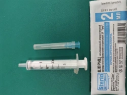 Injection syringe two-detail single use sterile 2A "Luer" with needle.