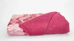 Quilted coverlets of cotton, synthetic fabrics, filled with synthetic and cotton fibres.
