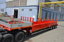 Semitrailer Politrans 94163-032. In design: metal platform with loading platform, with flatbed in the front hour.