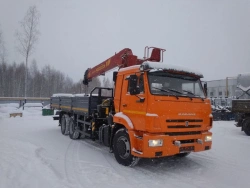 Special purpose vehicle with hydraulic loading crane of MKMA type on the basis of KAMAZ 65117 and its modifications 64K37N-UG